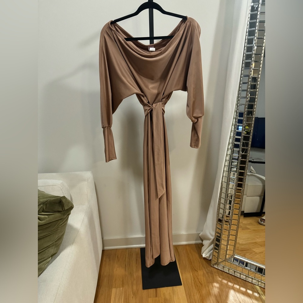 A new pantsuit w/stretch and fits nicely. Fits size 4, 6 & 8.